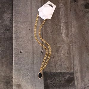 Gold tone chain black crystal pendant necklace